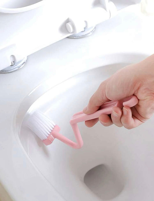 Toilet rim brush